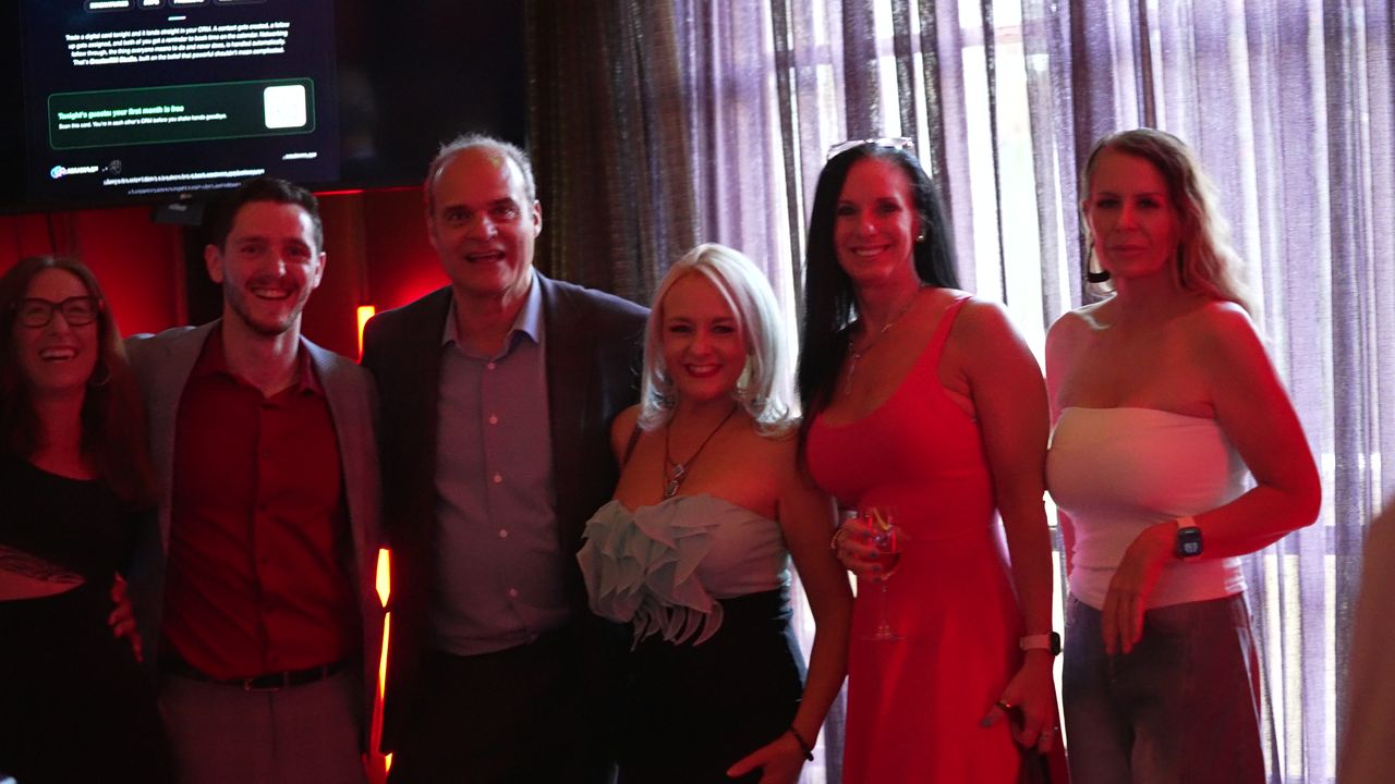 Group photo of guests with Justin Meyers